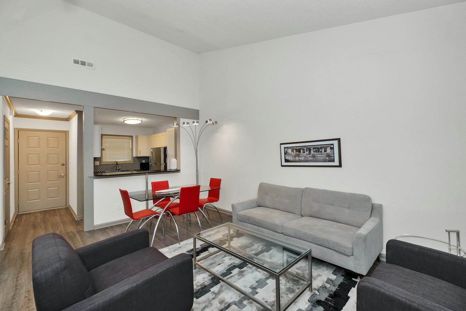 gray sofa near white wall